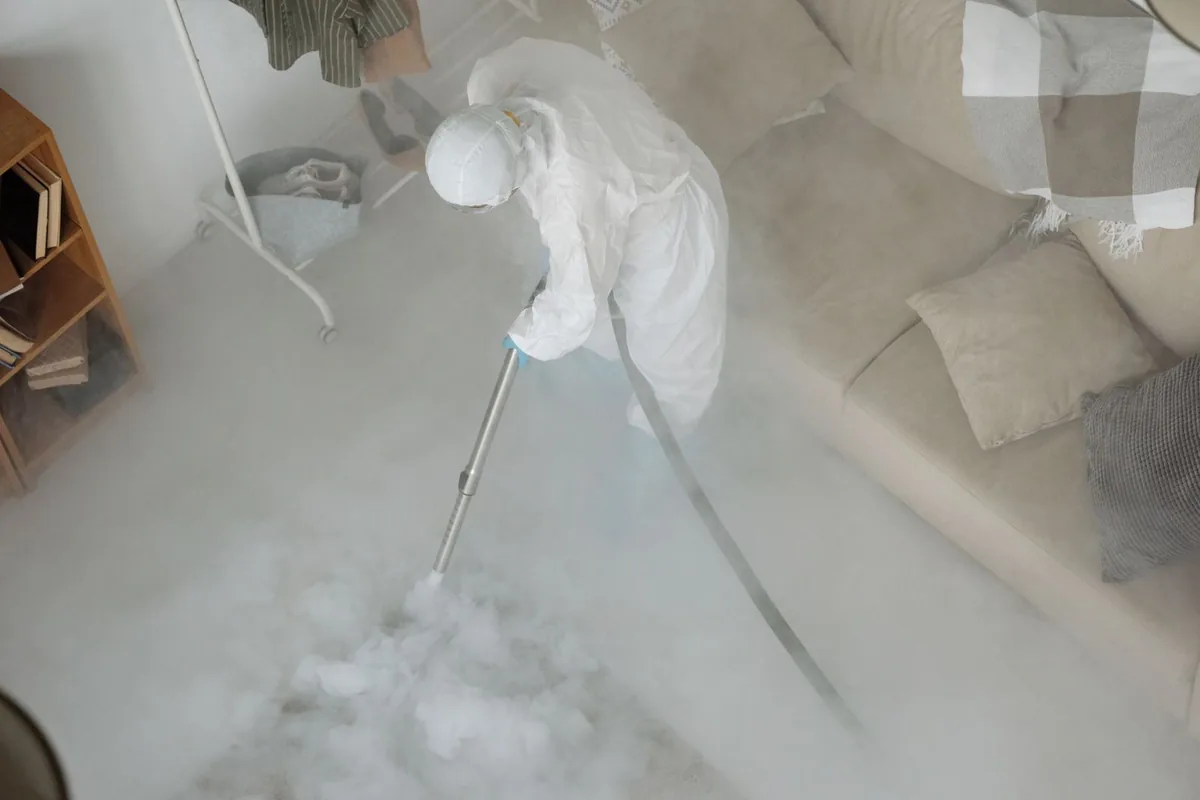 Biohazard cleanup technician in protective equipment, Floris, VA
